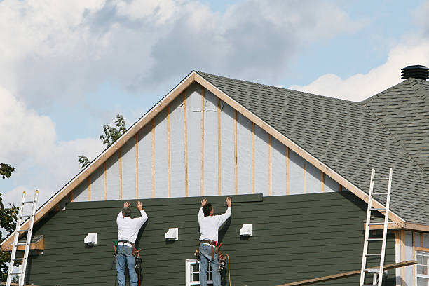 Professional Emergency Siding Repair technician working in Loveville, MD